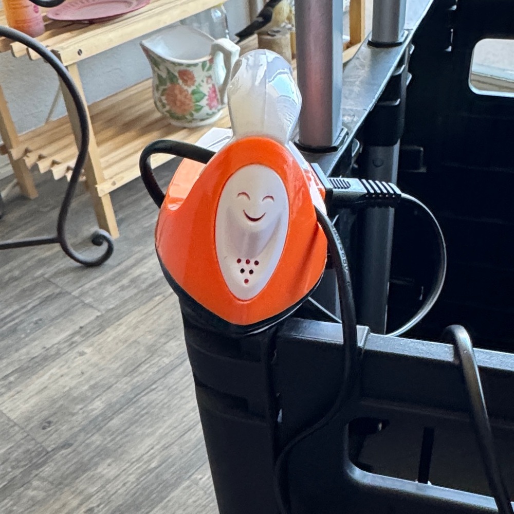 Orange Mini Iron with Smiley Face